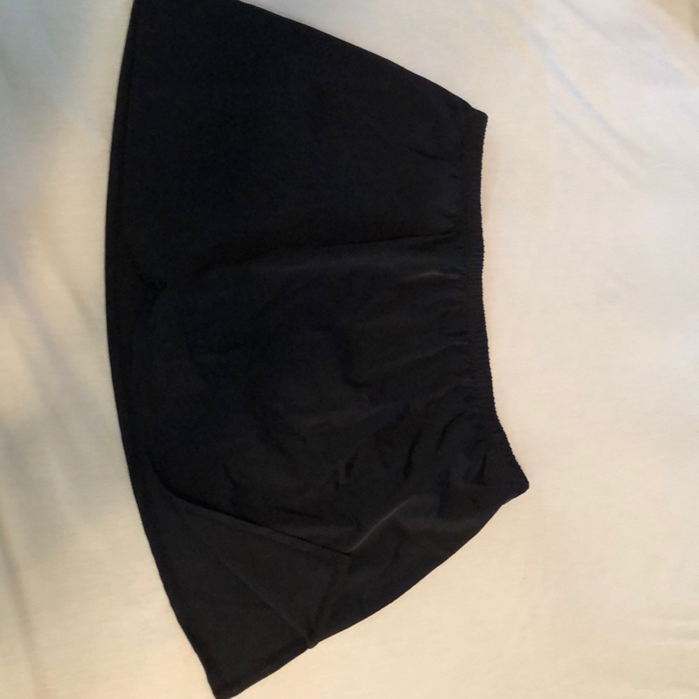 Swim bottom with attached skirt.